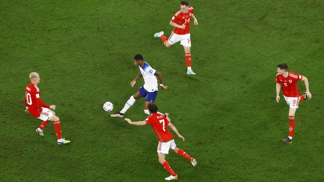 Inggris berhasil menaklukkan Wales dan melaju ke 16 besar Piala Dunia 2022. Marcus Rashford jadi bintang di laga ini.