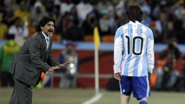FILE - In this June 27, 2010 file photo, Argentina head coach Diego Maradona, left, gives instructions to Argentina's Lionel Messi during the World Cup round of 16 soccer match between Argentina and Mexico at Soccer City in Johannesburg, South Africa. The Argentine soccer great who was among the best players ever and who led his country to the 1986 World Cup title before later struggling with cocaine use and obesity, died from a heart attack on Wednesday, Nov. 25, 2020, at his home in Buenos Aires. He was 60. (AP Photo/Matt Dunham, File)