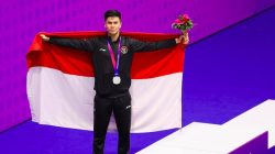 Atlet wushu Indonesia Edgar Xavier Marvelo raih medali perak Asian Games 2023 meski tampil dalam kondisi kurang ideal usai operasi pinggang, Minggu (24/9).